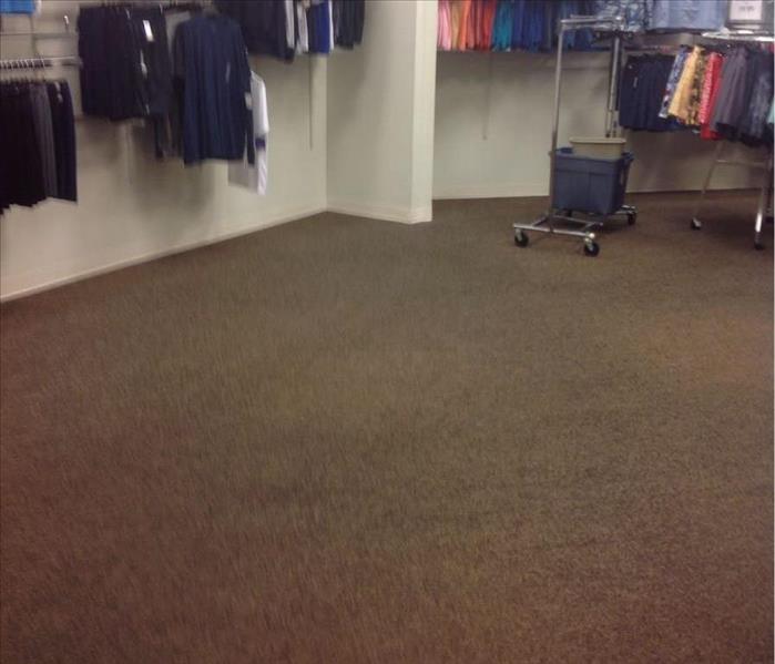 Floor in same clothing store completely dry and clean