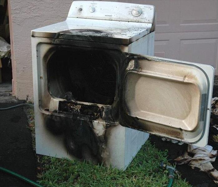 Dryer after it was removed from the property for cathching fire